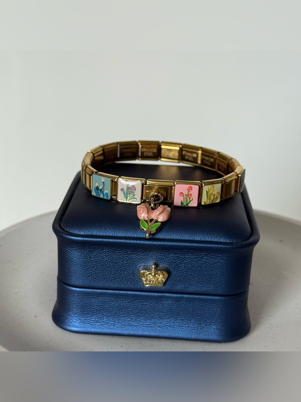 Gold-tone Italian charm bracelet with floral enamel links